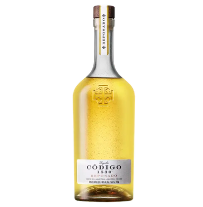 Bottle of Código tequila on a white background