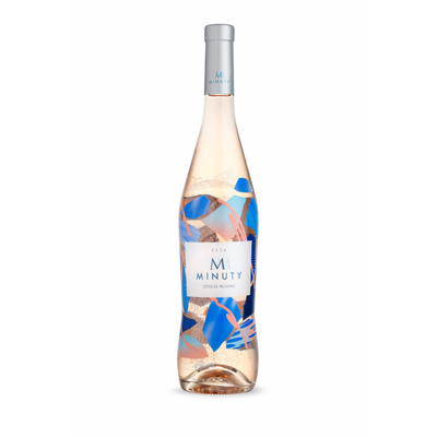 A bottle of Minuty Rosé wine with a silver cap and a white label featuring blue and gold abstract patterns, set against a plain white background.