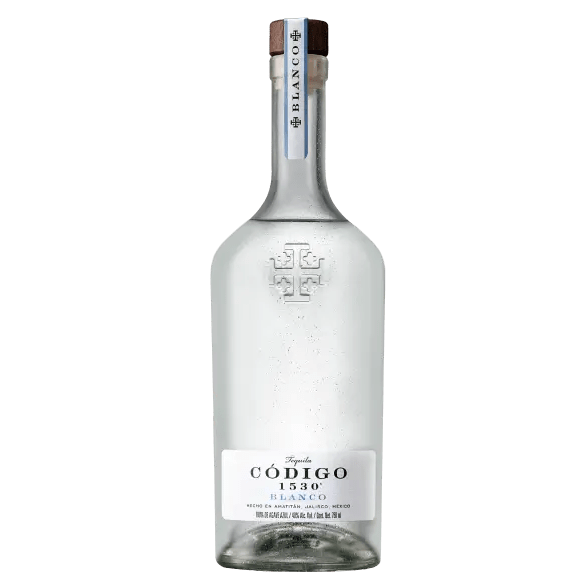 Clear bottle of Código 1530 Blanco tequila on a white background